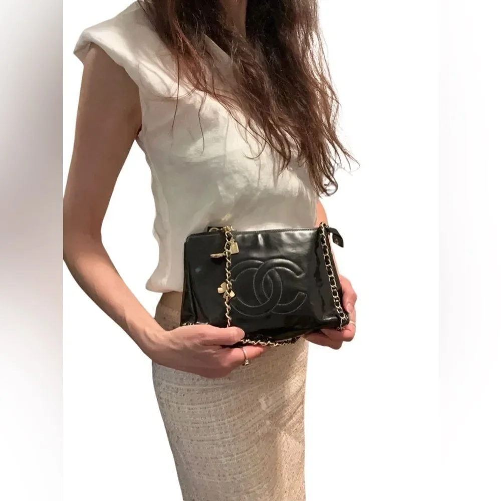 Chanel Black Pouch Bag with Iconic Logo added chain